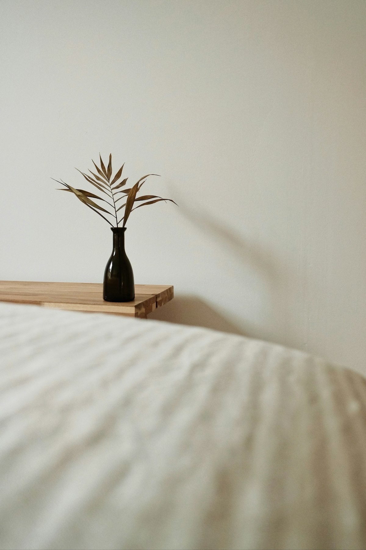 Quiet private treatment room with a candle and soft lighting